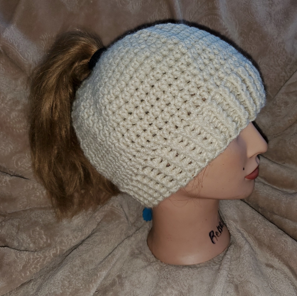 Crocheted messy bun beanie